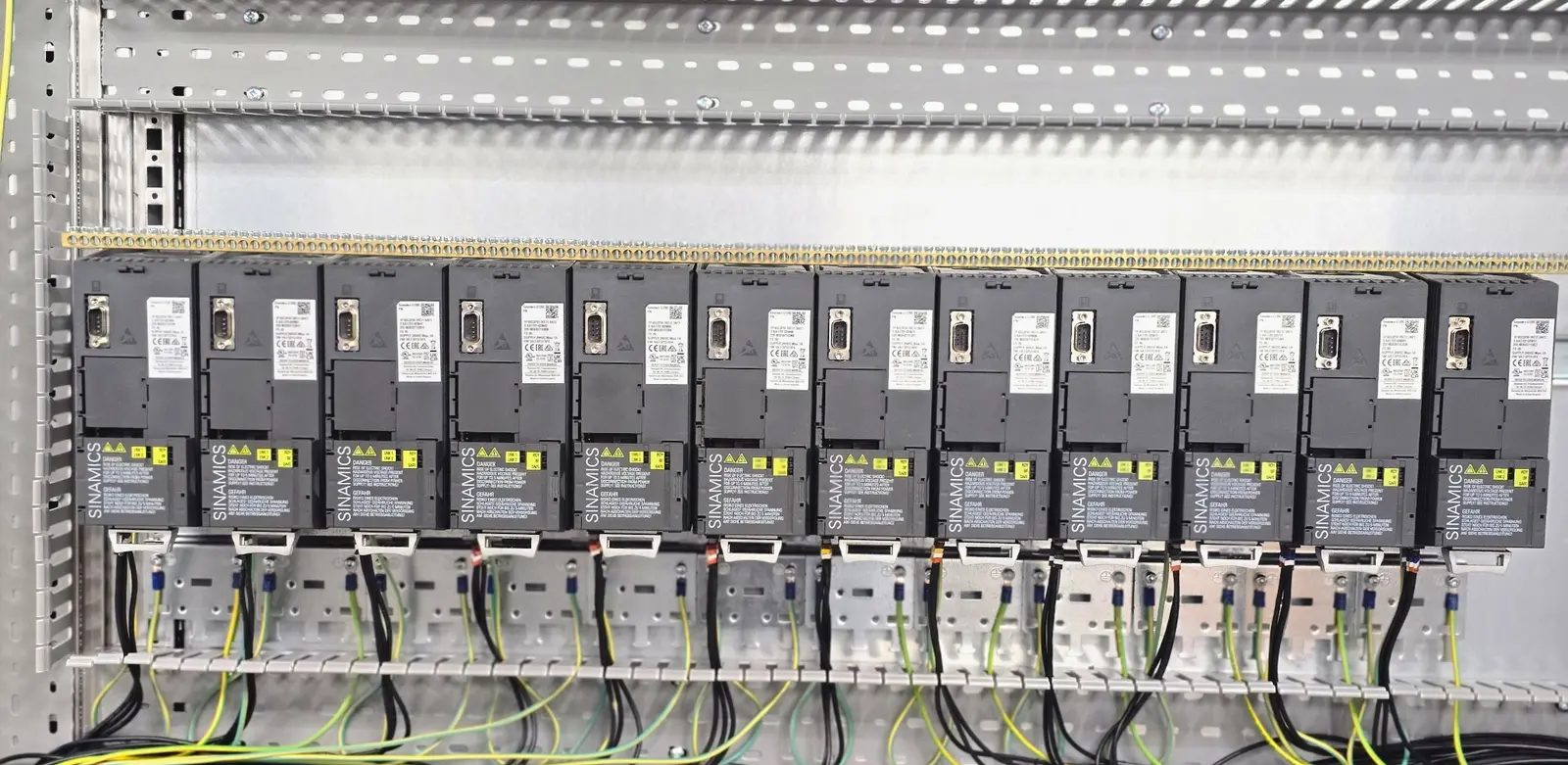 Aligned variable-speed drives and field wiring during control-panel build