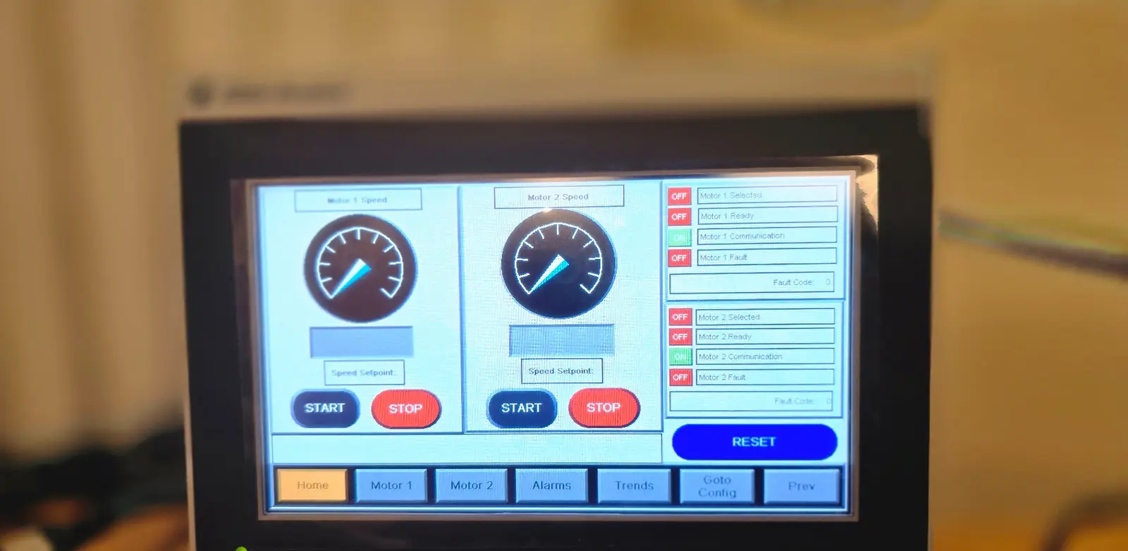 Industrial HMI for two motor channels with speed settings, status, alarms and trend navigation